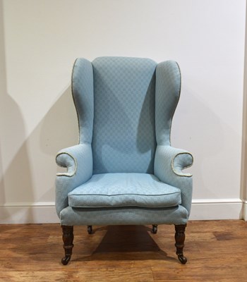 Lot 80A - Blue upholstered wing armchair 19th Century,...