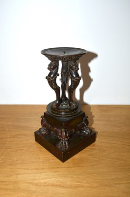 Lot 365 - Bronze classical monopodia candle holder...