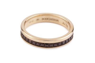 Lot 251 - An 18ct gold 'Quatre Classique' band ring by...