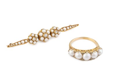 Lot 85 - A half pearl and diamond bar brooch, centred...