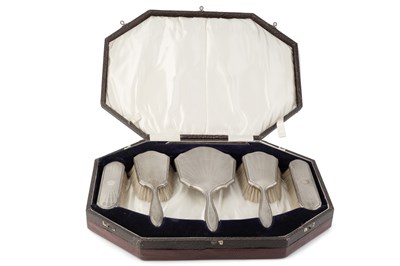 Lot 816 - A silver backed six piece dressing table set,...