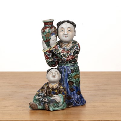 Lot 128 - Glazed figure group Japanese, circa 1900 the...