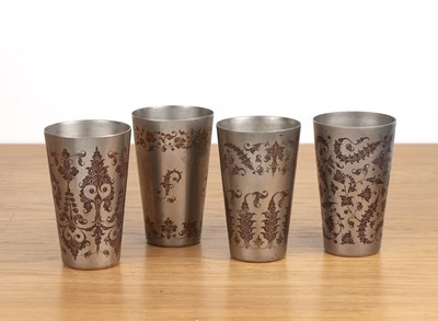 Lot 193 - Set of four engraved beakers Indian each with...