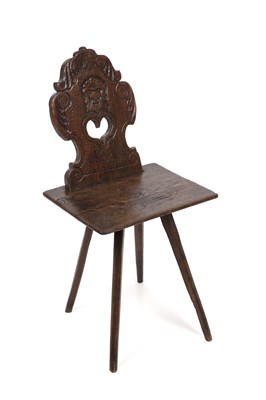 Lot 360 - A 17th century Swiss hall chair with a carved...