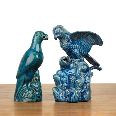 Lot 457 - Glazed turquoise model of a parrot and an...