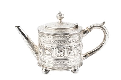 Lot A mid Victorian Scottish silver teapot, of...