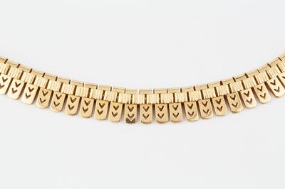 Lot 195 - A yellow precious metal collar necklace, of...