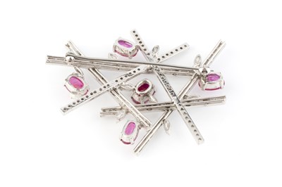 Lot 263 - A ruby and diamond panel brooch, of abstract...