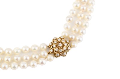 Lot 293 - A cultured pearl necklace with diamond set...