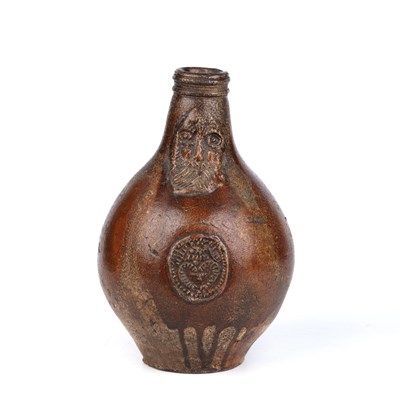 Lot 11 - A 17th century German stoneware Bellarmine Jug...