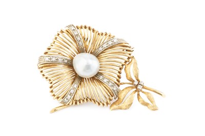 Lot 82 - A diamond and pearl flower brooch, modelled as...