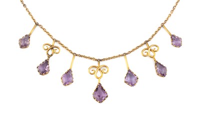 Lot 100 - An amethyst fringe necklace, the trace-link...