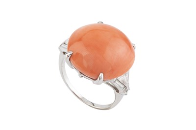 Lot A coral and diamond dress ring, the circular...