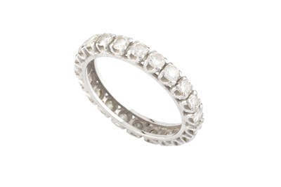 Lot 188 - A diamond full hoop eternity ring, claw set...