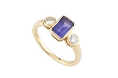 Lot 177 - A tanzanite and diamond three stone ring, the...