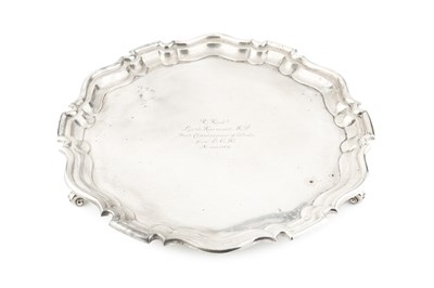 Lot 826 - An Edwardian silver salver, with shaped border...