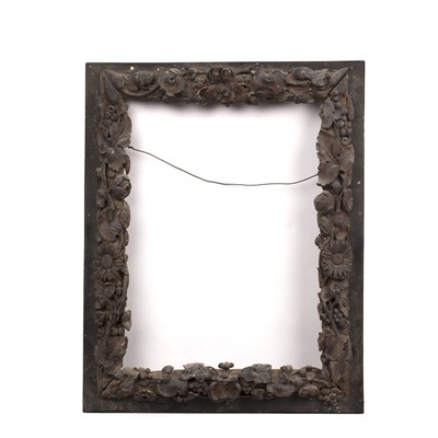 Lot 576 - An ebony veneered and walnut frame, the border...