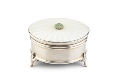 Lot 587 - A silver and enamel circular trinket box, the...