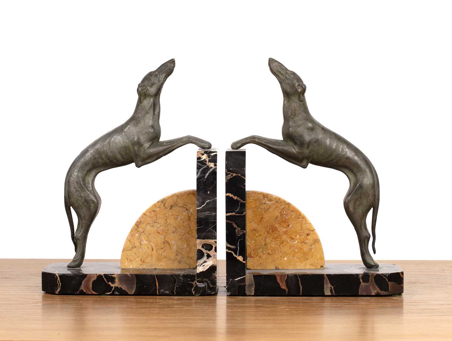 Lot 102 - Pair of Art Deco style bookends Modelled with...