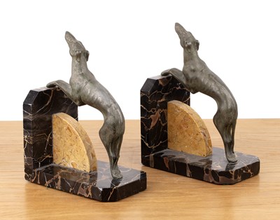 Lot 102 - Pair of Art Deco style bookends Modelled with...
