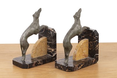 Lot 102 - Pair of Art Deco style bookends Modelled with...