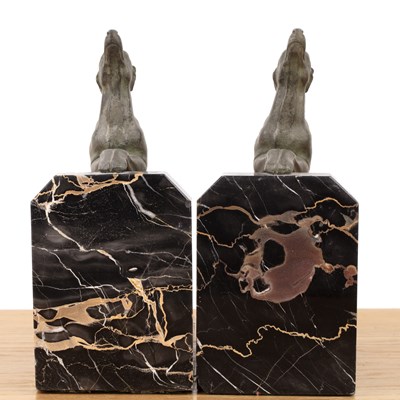 Lot 102 - Pair of Art Deco style bookends Modelled with...