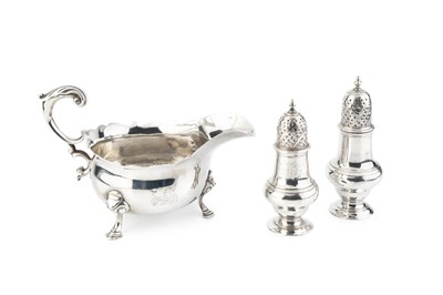 Lot 849 - Two early George III silver baluster pepper...