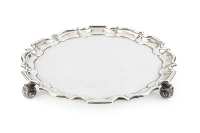 Lot 851 - An Edwardian silver small salver, with shaped...