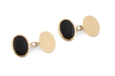 Lot 76 - A pair of 9ct gold and onyx cufflinks, with...