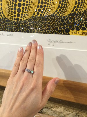 Lot 265 - A diamond three stone ring, the graduated...