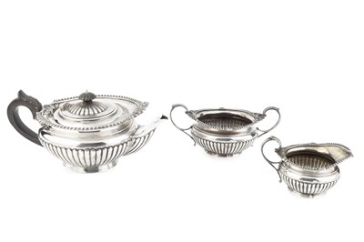 Lot An Edwardian silver three piece tea service,...