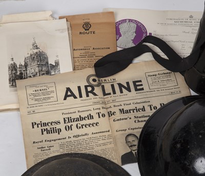 Lot 73 - WWII items to include three WWII helmets,...