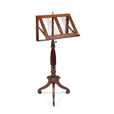 Lot 117 - A Regency style walnut, height adjustable...