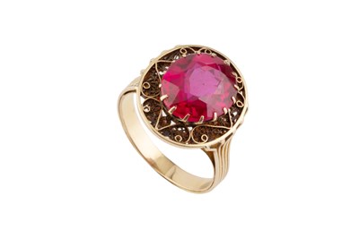 Lot 98 - A synthetic ruby single stone ring, the oval...