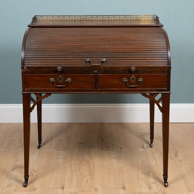 Lot 260 - A George III mahogany roll-top desk