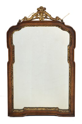 Lot 226 - An 18th century style walnut and parcel gilt mirror