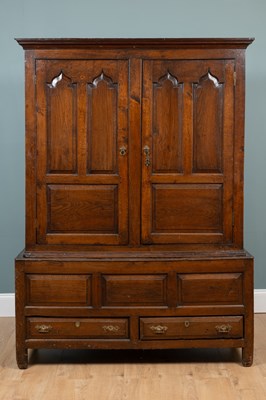 Lot 217 - A George III oak cupboard