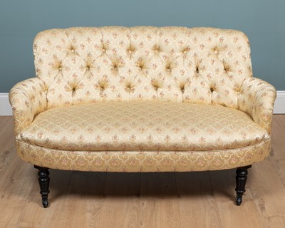 Lot 473 - A Victorian silk-upholstered button-back settee