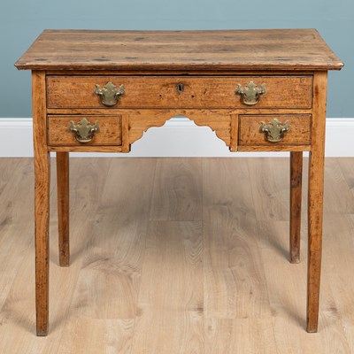 Lot 241 - A 19th century oak lowboy