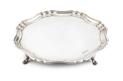 Lot 757 - A George V silver salver, with shaped border,...