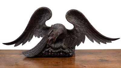 Lot 319 - A 19th century carved oak eagle cresting