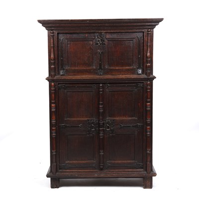 Lot 19 - A 16th century Flemish oak lamp cupboard with...