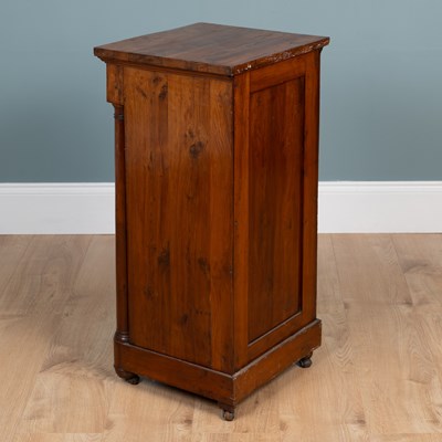 Lot 461 - A 19th century Empire-style yew wood bedside cupboard