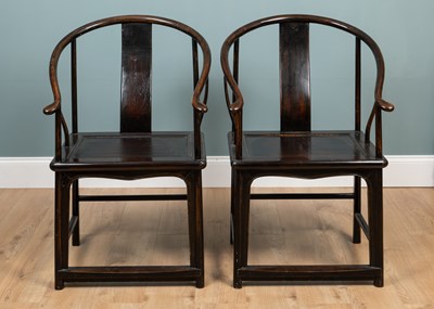 Lot 365 - A pair of early 20th century Chinese lacquered horseshoe chairs