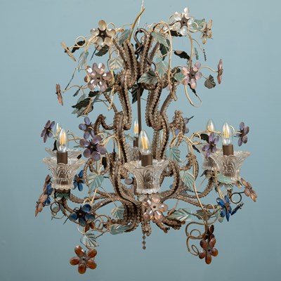 Lot 408 - A wirework and glass six-branch chandelier.