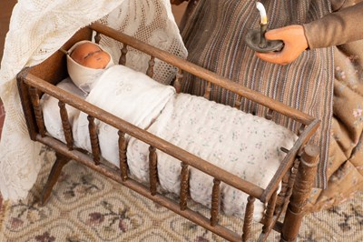 Lot 467 - A 1930s rocking baby automaton by Jean-Paul Fabre