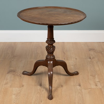 Lot 227 - A George III mahogany tilt-top tripod table