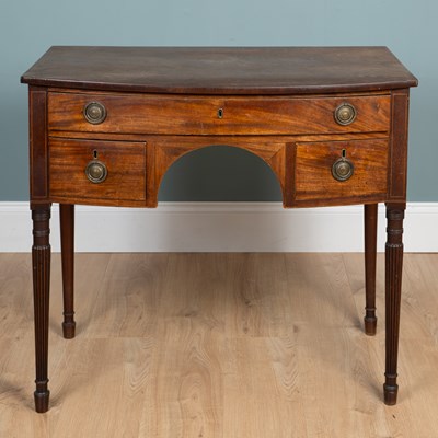 Lot 209 - A Regency mahogany bow-fronted dressing table