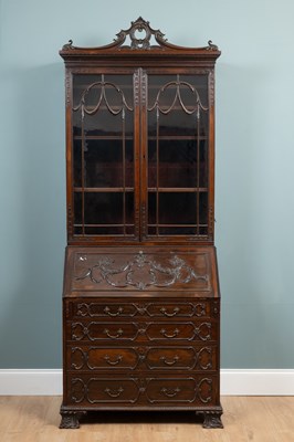 Lot 167 - An Edwardian Chippendale-style bureau bookcase