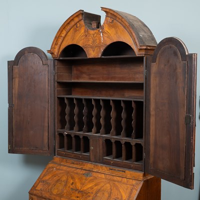 Lot 332 - A Queen Anne burr walnut and oak bureau bookcase
